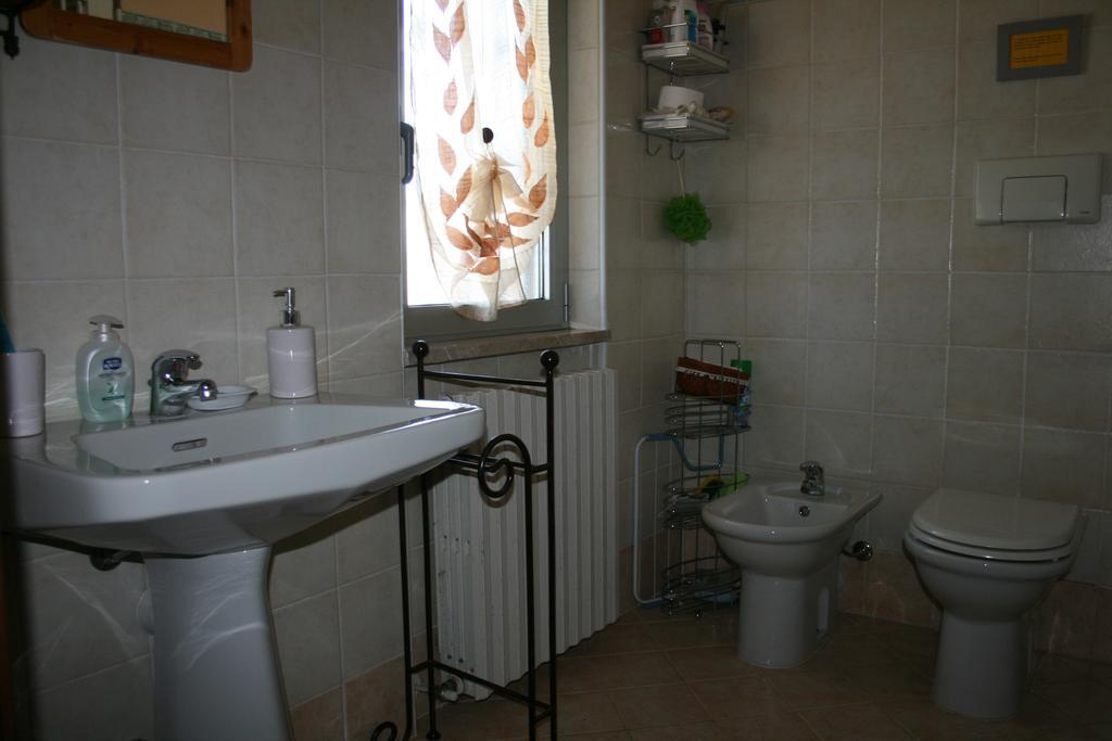 B&B Il Glicine Bedizzole Rum bild