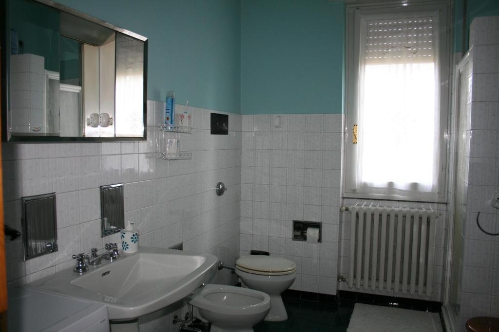 B&B Il Glicine Bedizzole Rum bild